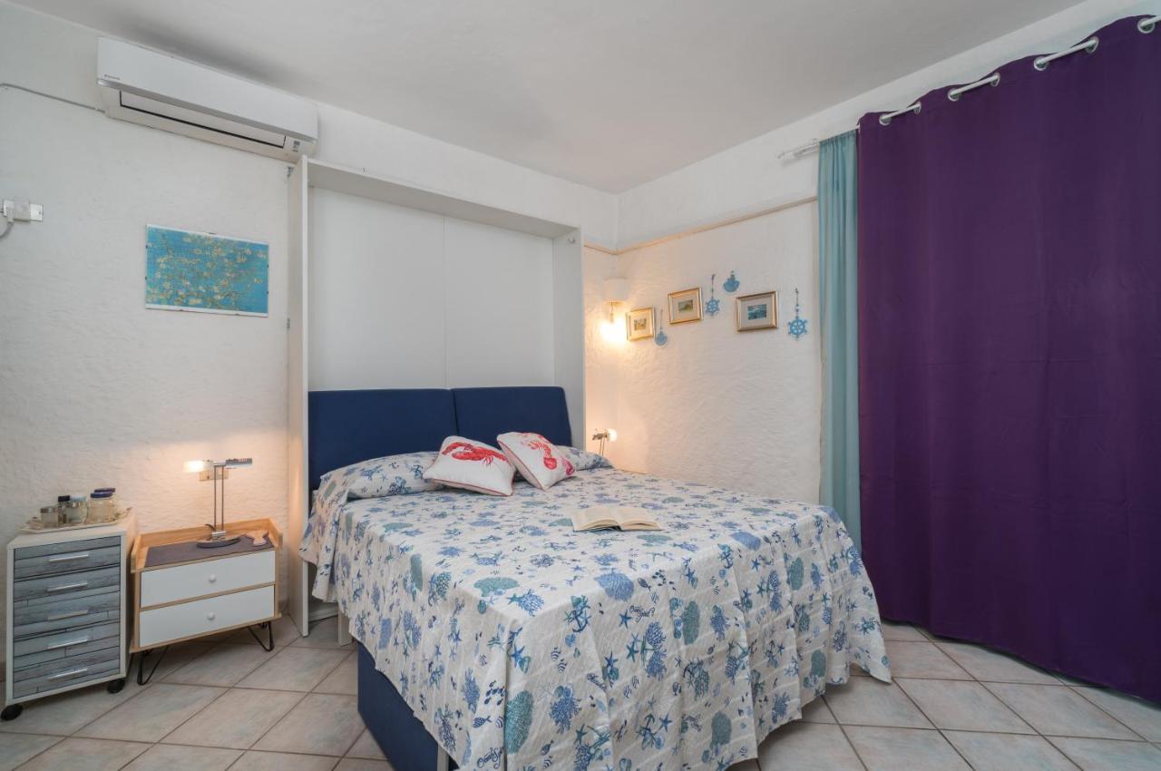 Sardinia Family Villas - Cannigione Beach Apartments ภายนอก รูปภาพ
