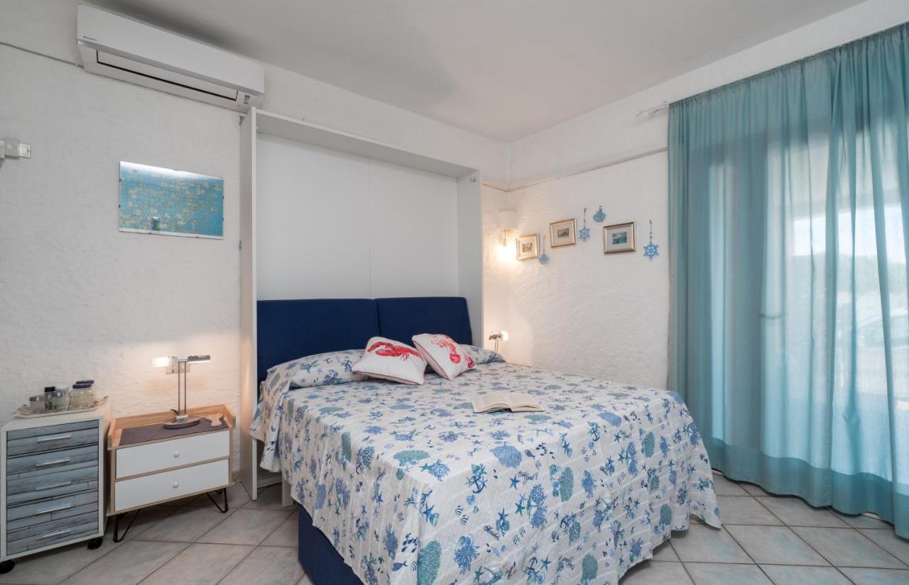Sardinia Family Villas - Cannigione Beach Apartments ภายนอก รูปภาพ