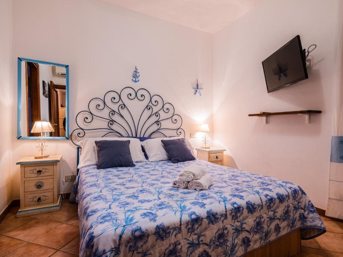 Sardinia Family Villas - Cannigione Beach Apartments ภายนอก รูปภาพ