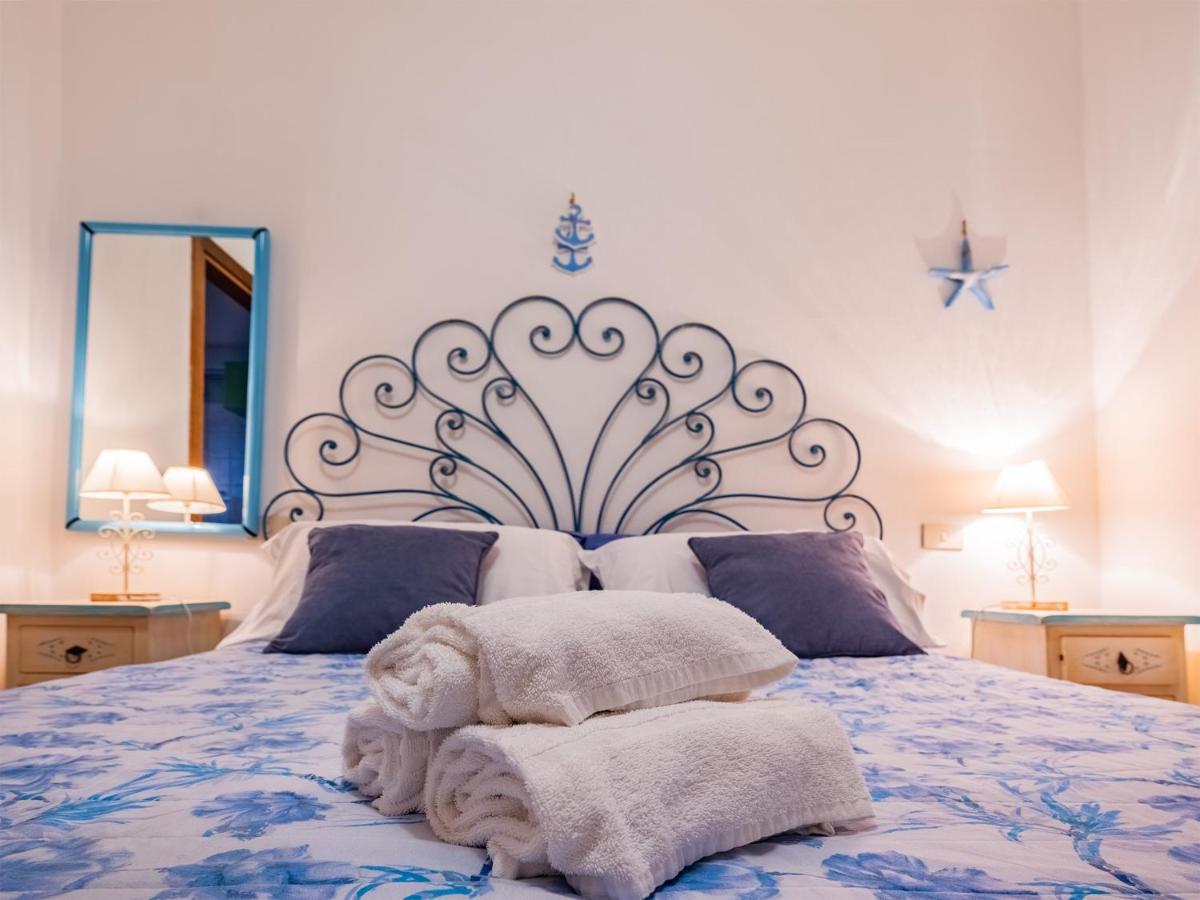 Sardinia Family Villas - Cannigione Beach Apartments ภายนอก รูปภาพ