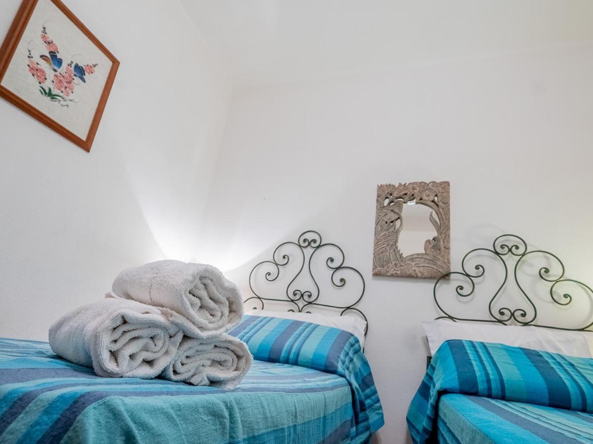 Sardinia Family Villas - Cannigione Beach Apartments ภายนอก รูปภาพ