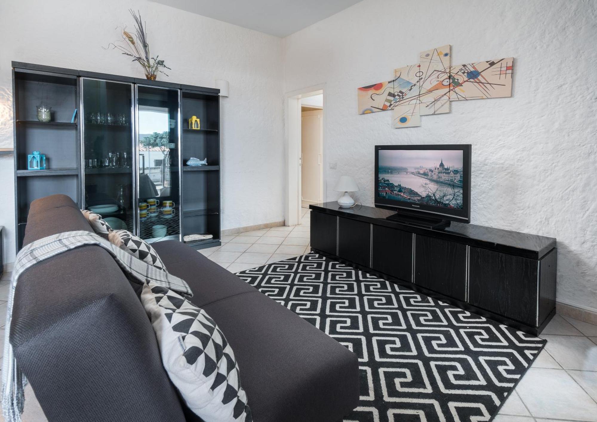 Sardinia Family Villas - Cannigione Beach Apartments ภายนอก รูปภาพ